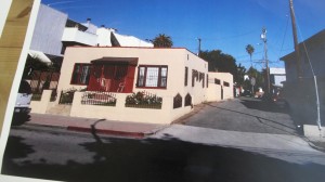 Before: A "spanish-ized" stucco box from the 1930s, with little to recommend it.