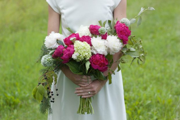 A bridal bouquet featuring flowers from Alaska Peony Cooperative farms